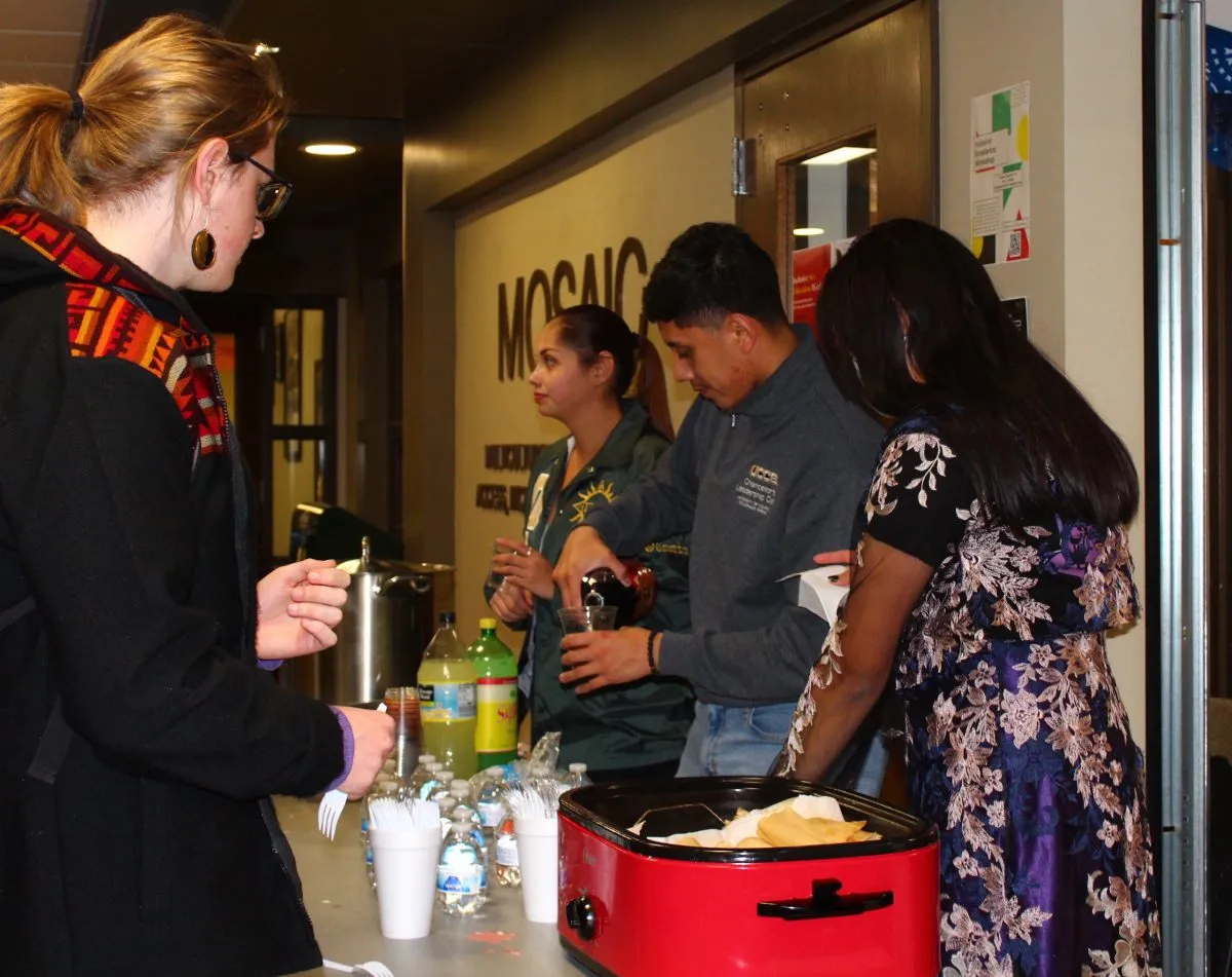 Velasco volunteering at an LSU event